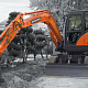 Мини-экскаватор Develon (Doosan) DX55W миниатюра 1